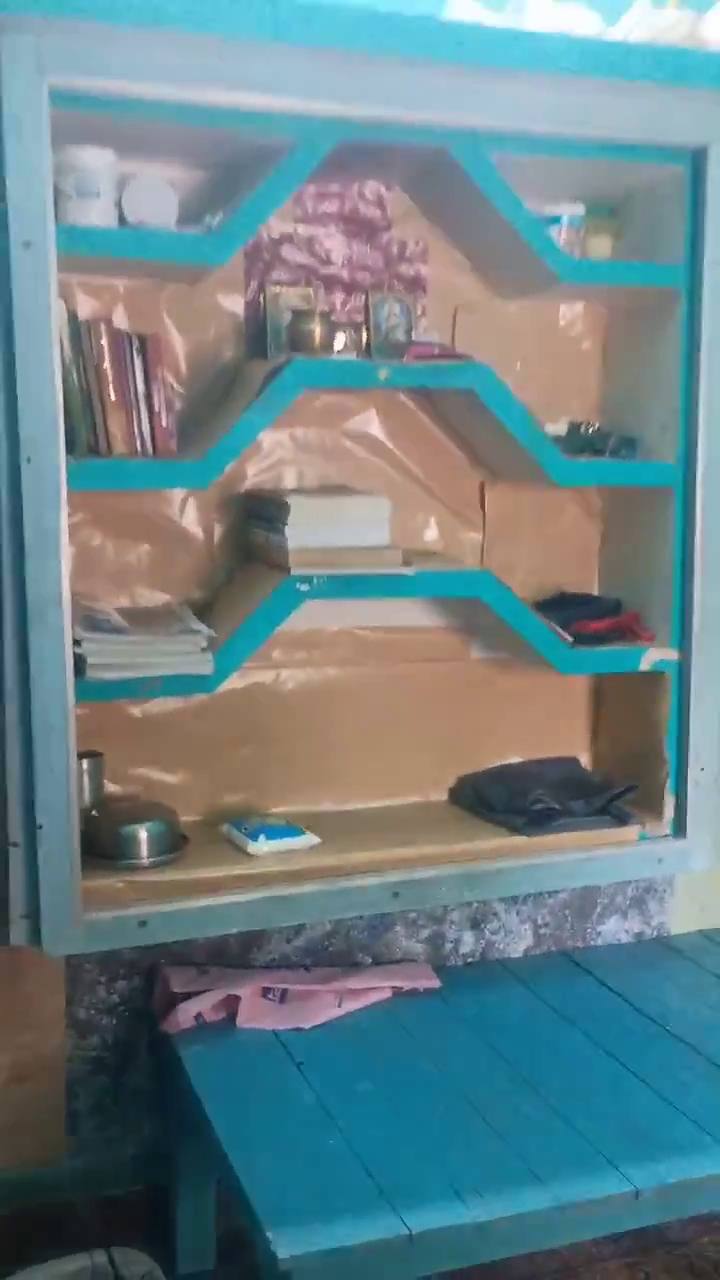 Built-in wall shelves with books